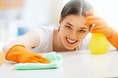 Technician performing carpet steam cleaning