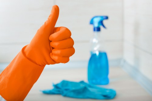 Technician removing stains from carpet
